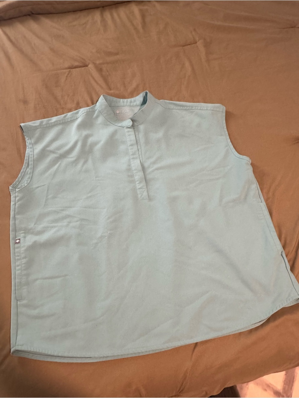 Figs Sleeveless Mandarin Collar Top in Pale Blue